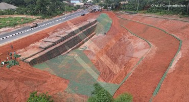 Road widening and slope restoration with geosynthetic reinforced soil slope, Nigeria