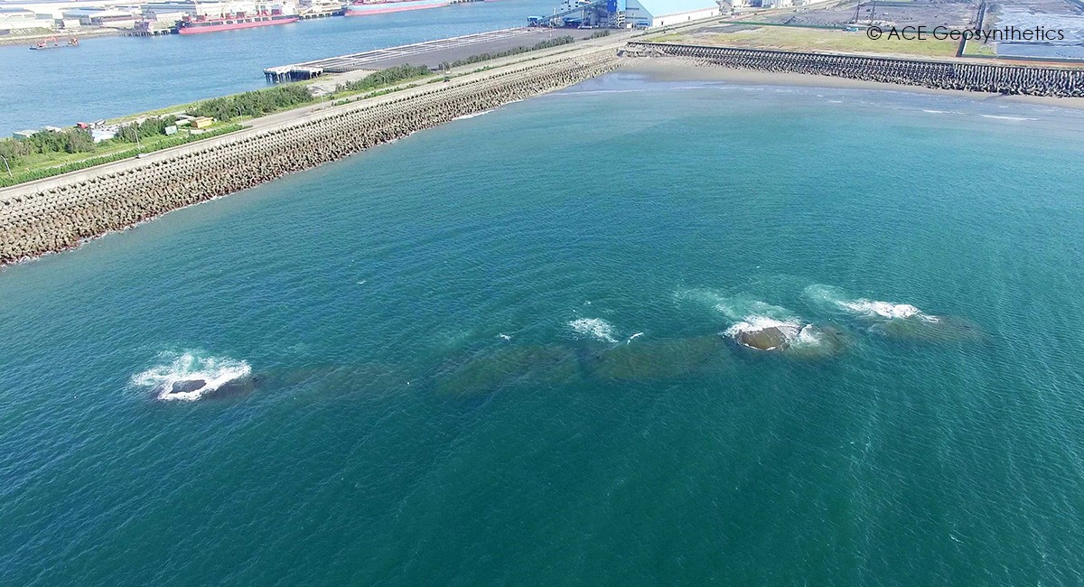 Geotextile Tubes as Submerged Breakwaters for Harbor Protection, Taichung, Taiwan